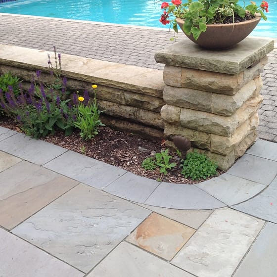 Slate Pool Deck Leading to Concrete Pavers Pool Surround